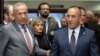 Kosovo's Prime Minister Ramush Haradinaj (right) and Foreign Minister Behgjet Pacolli attend the meeting in Brussels on December 17.
