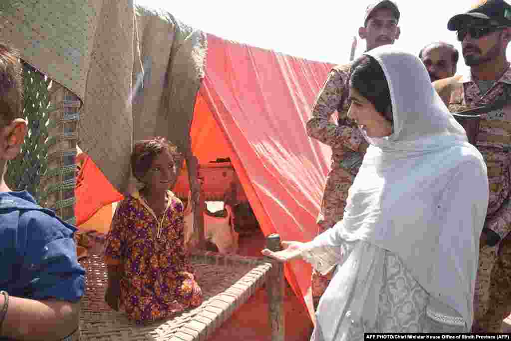 Yousafzai meets with victims of Pakistan's devastating monsoon floods on October 12 in only her second visit since being shot by the Taliban a decade before.
