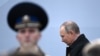Russian President Vladimir Putin arrives to watch the Victory Day military parade on Red Square in central Moscow on May 9. 