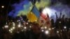 People attend a "March for Europe" rally in support of Georgia and Ukraine's EU membership bids in Tbilisi on June 24.