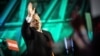 Hungarian Prime Minister Viktor Orban waves to his supporters during a ruling Fidesz party event after the elections on April 3.