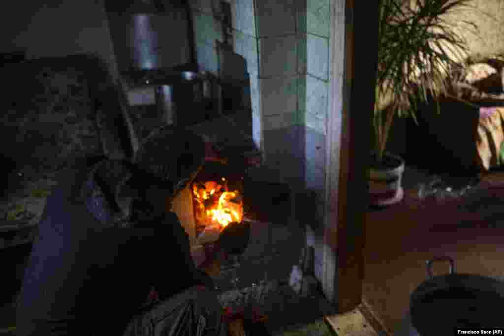 "It's not comfortable. We spend a lot of time gathering wood. You can see the situation we're living in," Palyanitsa said. 
