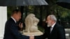 Russian President Vladimir Putin (left) welcomes Armenian Prime Minister Nikol Pashinian in Sochi on October 31.