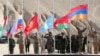 2021-nji ýylda Täjigistanda geçirilen KHŞG harby-okuw türgenleşiklerinde bileleşige agza Täjigistanyň, Russiýanyň, Gyrgyzystanyň, Gazagystanyň, Belarusyň we Ermenistanyň baýdaklary galgadylýar.