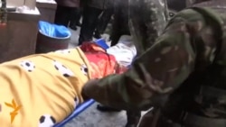 Body Of Killed Ukrainian Protester Leaves Makeshift Hospital