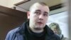 SBU officer Andriy Drach is escorted inside a court building in Moscow on January 15.