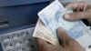 Leaders Hail Plan To Stabilize Euro