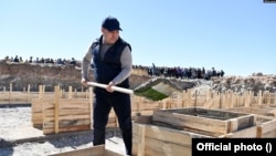 Kyrgyz President Sadyr Japarov officially launches the construction of a residential area for ethnic Kyrgyz returnees in Osh Province in September 2021.