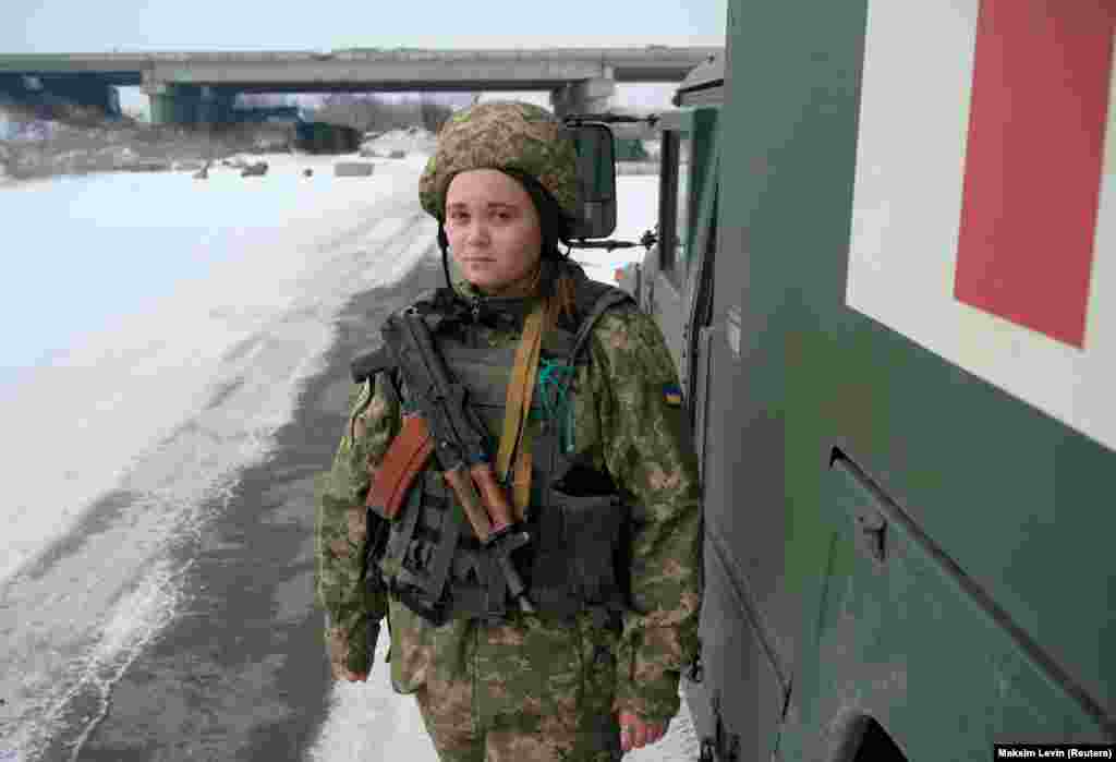 A Ukrainian medic photographed near the line of separation from Russia-backed separatists outside Pisky, a village in Ukraine's Donetsk region, on January 26. 