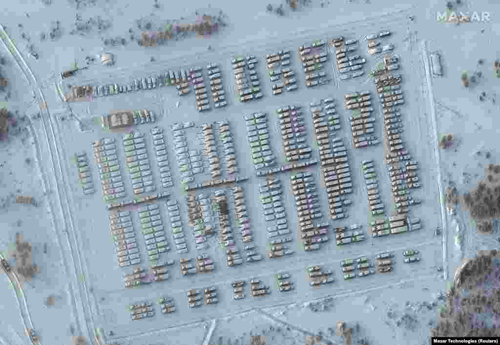An older satellite image shows snow-dusted Russian military vehicles parked in Yelnya, Russia, on January 19. Yelnya is in Russia's northwestern Smolensk region, around 120 kilometers from the border with Belarus and 260 kilometers from Ukraine. 
