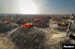 Graves of Russian Wagner mercenary fighters are seen in a cemetery near the village of Bakinskaya in Russia's Krasnodar region on January 22.