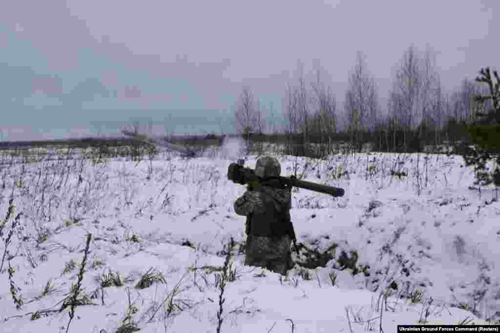 A Ukrainian serviceman releases a shoulder-fired missile during drills in Ukraine's Volyn Region on January 26. 