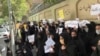Relatives of people sentenced to death in Iran protest outside the country's judiciary headquarters earlier this week.