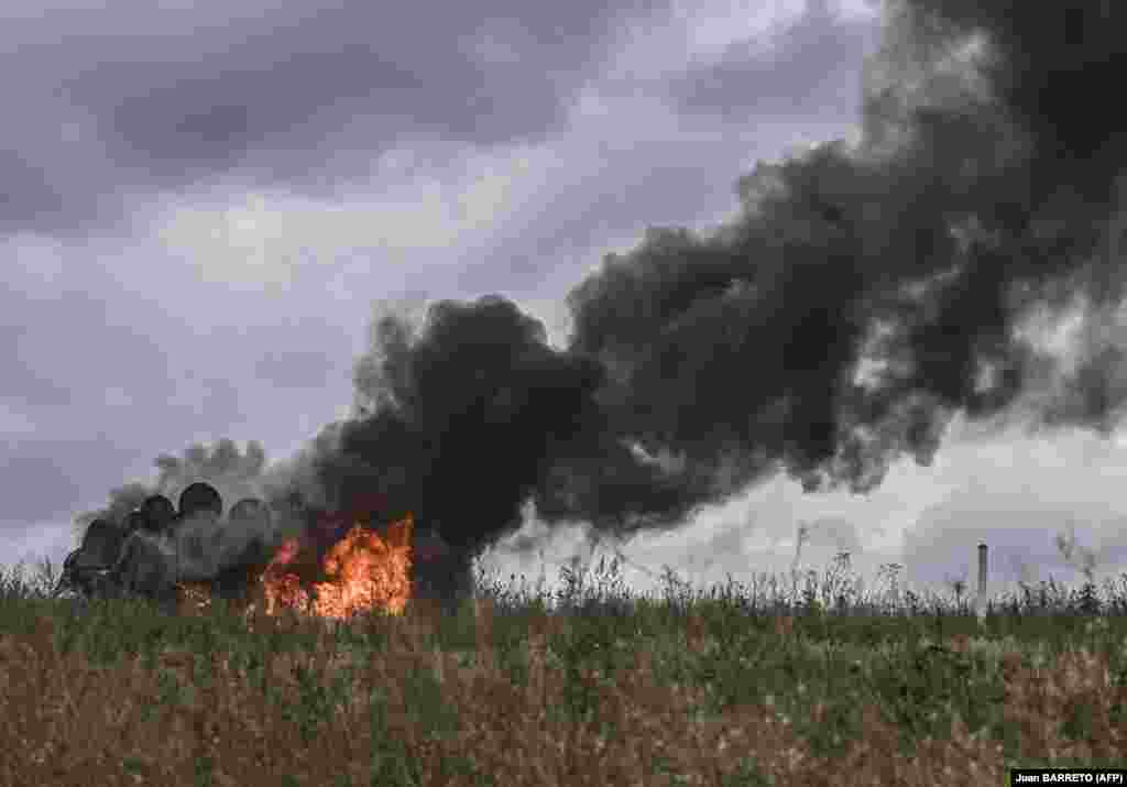 A Russian MT-LB armored personnel carrier burns in a field on the outskirts of Izyum on September 14. 
