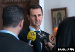 Syrian President Bashar al-Assad has been supported by Russia and Iran in his war-torn country. (file photo)