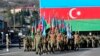 Azerbaijani troops march during a military parade in Khankendi, known by Armenians as Stepanakert, in Nagorno-Karabakh, on November 8. 
