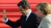  Nicolas Sarkozy și Angela Merkel în așteptarea lui Dmitri Medvedev