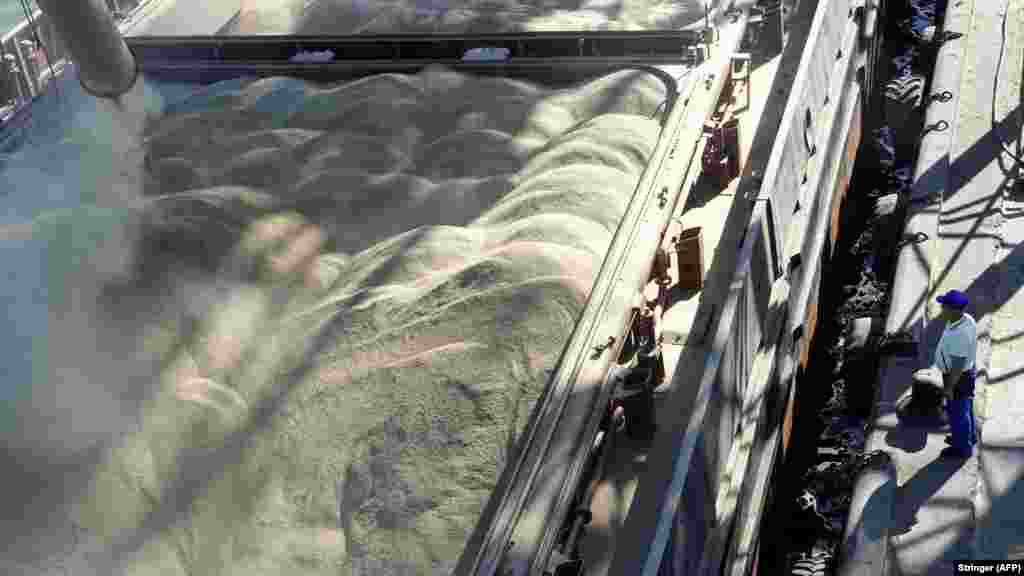 Barley is loaded onto a vessel in the Russian port of Rostov-on-Don on June 11.&nbsp; Russian President Vladimir Putin has blamed the looming food crisis on sanctions against Russian exports.&nbsp; &nbsp;
