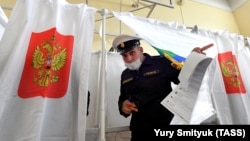 A naval cadet leaves a voting booth in Vladivostok on September 17.