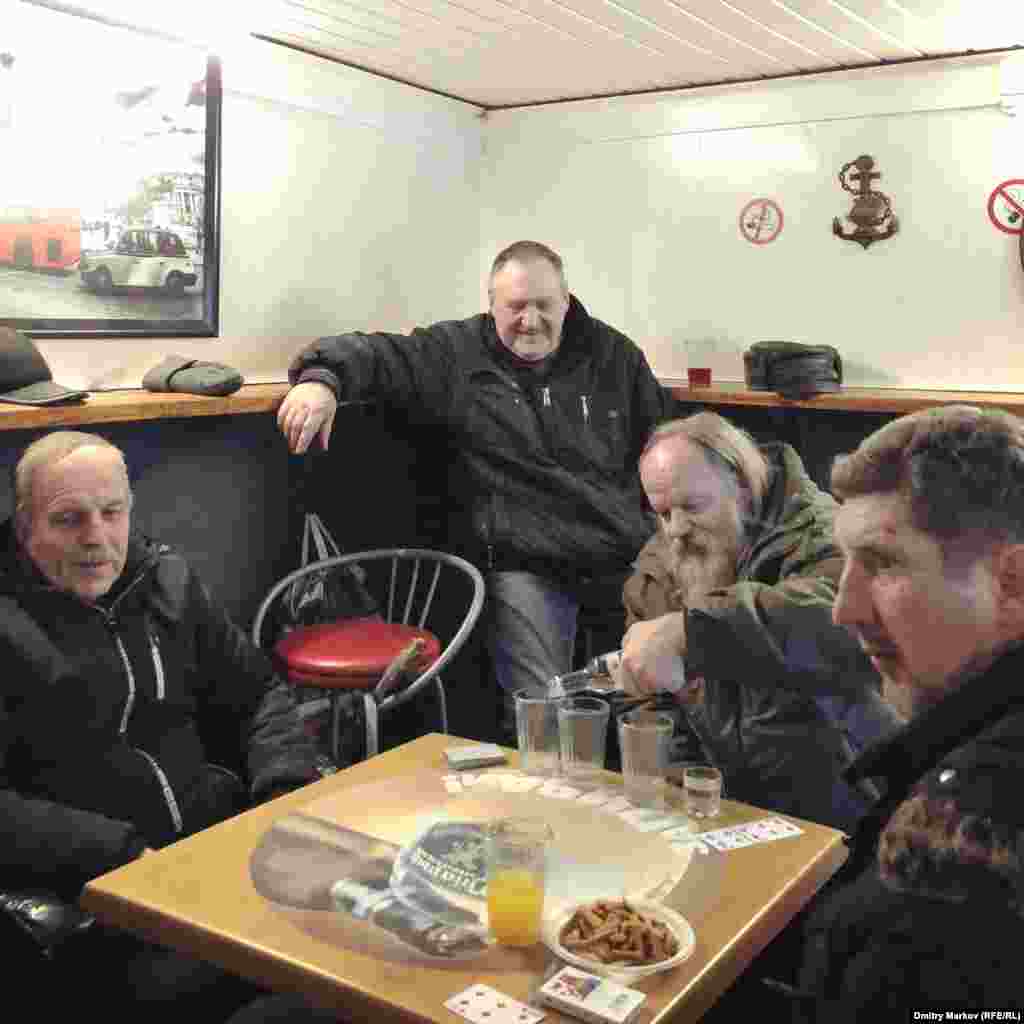 A group of friends settles in to discuss the election over vodka, juice, and fried breadsticks. 