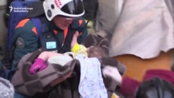 Russian Rescuers Pull Infant From Collapsed Building