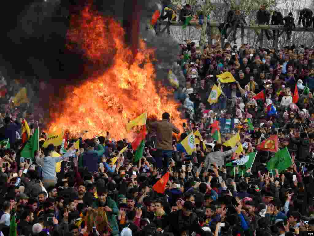 Crowds around a bonfire during the celebrations in Diyarbakir, Turkey, on March 21. 
