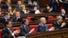 Armenia - Deputies from the ruling Republican Party applaud after the National Assembly adopts a statement on the 100th anniversary of the Armenian genocide, Yerevan, 21Apr2015.