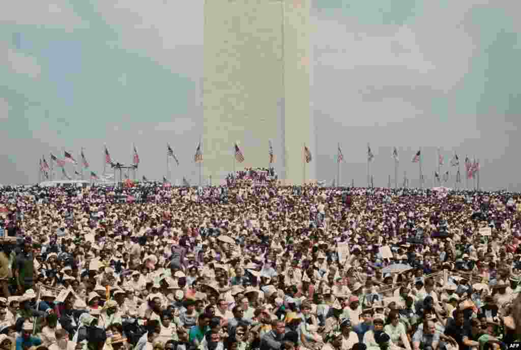 People gather at the Poor People's March on June 19, 1968, in Washington, D.C. The Poor People's Campaign was organized in 1968 by Martin Luther King Jr. and the Southern Christian Leadership Conference (SCLC) to demand economic aid to the poorest communities of the United States. The campaign continued under new leadership after King's assassination in April 1968.