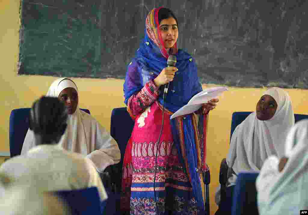 Yousafzai addresses young refugees at Kenya's sprawling Dadaab refugee complex during a visit organized by the UN High Commissioner for Refugees in Garissa, Kenya, on July 12, 2016.