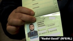 Old passport photo of bearded Badriddin Safaraliyev