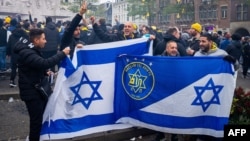 Maccabi Tel Aviv supporters gather in Amsterdam ahead of the game against Ajax on November 7. 