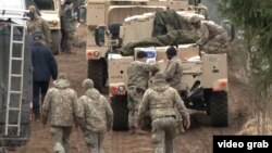 Search and recovery efforts take place at the training site in Lithuania where several US soldiers went missing during NATO exercises on March 28. The bodies of three of the soldiers were found on March 31. The search continues for a fourth US soldier who remains missing. 