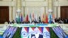 Participanții summitului de la Dușanbe vizionând discursul premierului indian Narendra Modi. 17 septembrie 2021