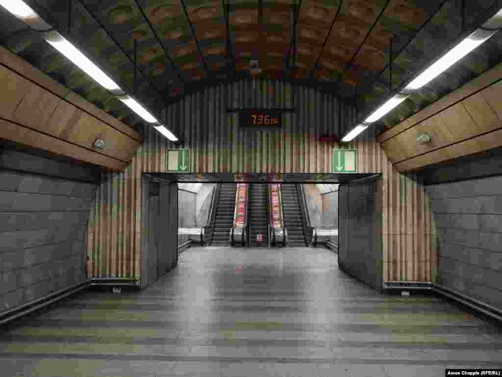 An empty subway station entrance on March 17 at 7:36 a.m. -- what would usually be the peak of rush hour. Although transport links remain fully operational, only a fraction of the usual passengers were using public transport. 