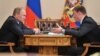 Russian President Vladimir Putin (left) appointed Andrei Turchak (right) as the governor of the Altai Republic, which is seen as a demotion by observers. (file photo)