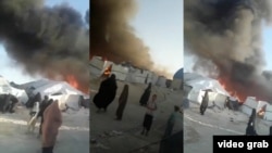 Tádzsik nők sátrai a szíriai Al-Havl menekülttáborban