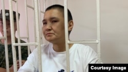 Рита Карасартова сот залында.