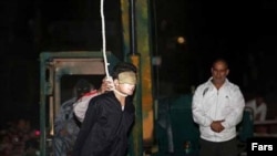 Convicted murderer Alireza Molla-Soltani is prepared for execution by public hanging on September 21.