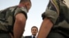France Honors 10 Dead Troops, To Debate Afghan Role