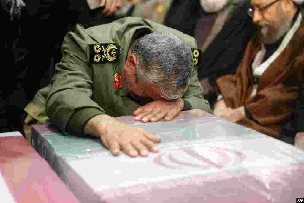The new Quds Force leader, General Ismail Qaani, wept on the flag-draped coffin of his slain predecessor, Qasem Soleimani.