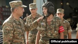 Armenia - Defense Minister Seyran Ohanyan (L) visits an Armenian army base deployed near the border with Azerbaijan, 20Aug2013.
