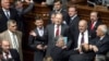 Ukraine -- Parliament Speaker Arseniy Yatsenyuk (C) speaks with lawmakers loyal to prime minister who block speaker's chair, Kyiv, 13May2008