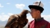 KYRGYZSTAN -- A Kyrgyz berkutchi (eagle hunter) attends a traditional ethnofestival in Ton village near Issyk-Kul lake, July 15, 2019