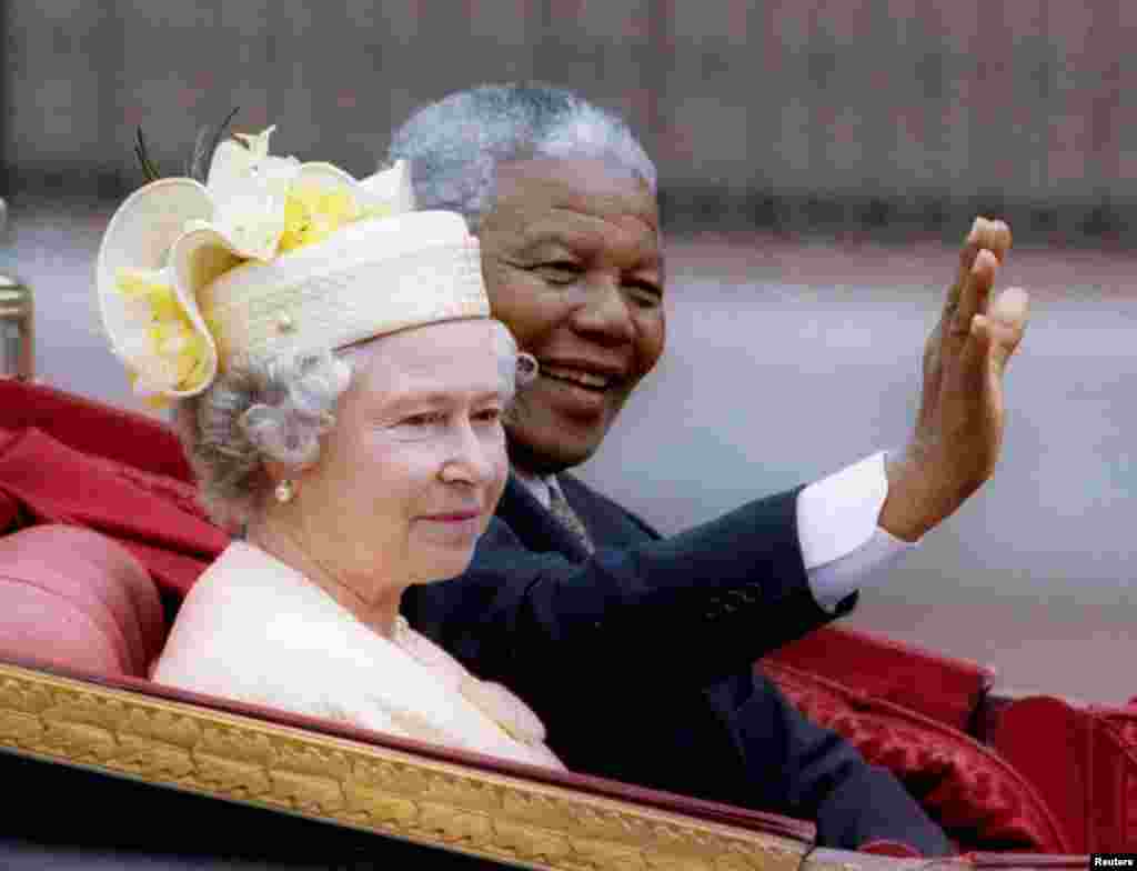 Nelson Mandela with Queen Elizabeth II on the first day of his state visit to Britain in 1996.