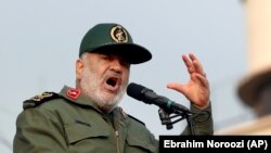 Revolutionary Guards head Hossein Salami speaking at the pro-government rally in Tehran on November 25. 