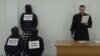 Russian Court Arrests Activist For YouTube Show Mocking Putin, Close Associates