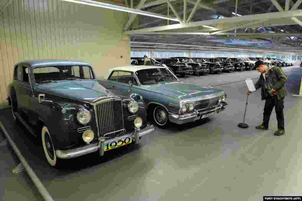 A 2014 image showing a corner of Yanukovych's car collection. Soon after he fled for Russia, Yanukovych's residence was opened to the public, revealing vast evidence of corruption. 