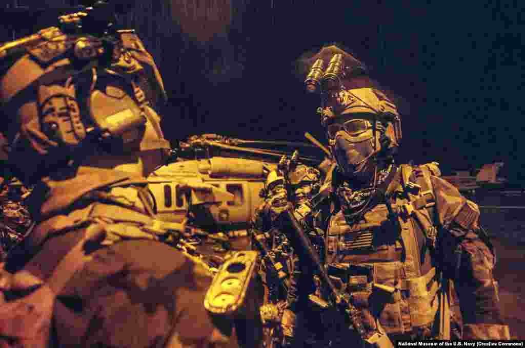 U.S. Navy Seals during training (file photo) In the early morning of May 2, 2011, dozens of U.S. Navy Seal commandos were flown from an air base in Afghanistan to the compound in Abottabad. The teams flew in stealth-coated helicopters and skimmed low above the terrain to avoid being detected by the Pakistani military. 