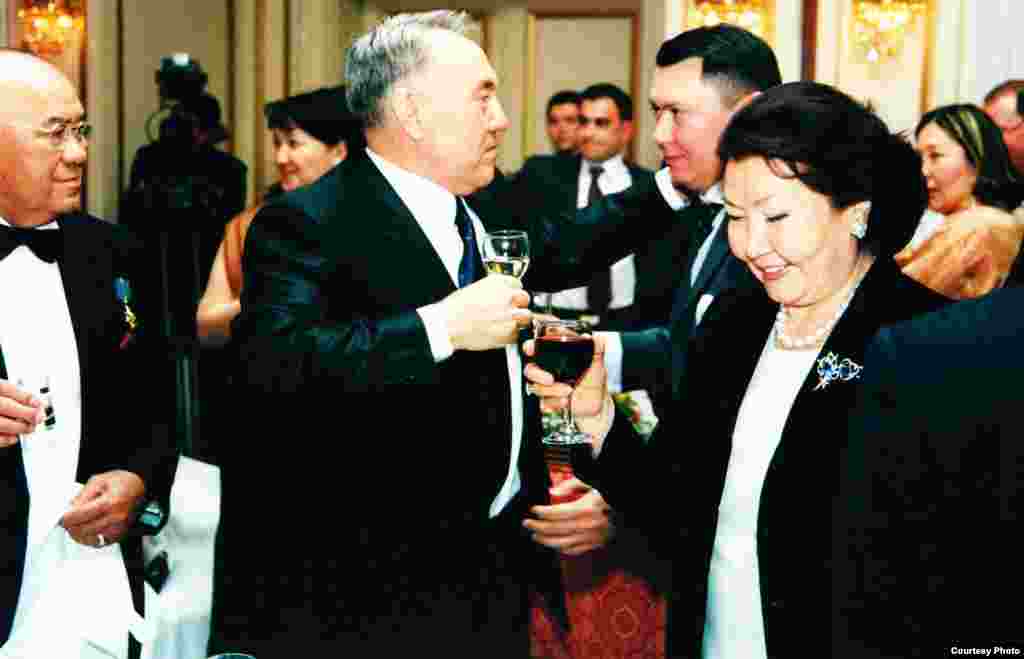 Aliev's father, Mukhtar (left), President Nursultan Nazarbaev, Rakhat Aliev, and Sara Nazarbaeva in a photo predating the criminal charges. While Aliev remained in Austria, Kazakh authorities unsuccessfully requested his extradition. Kazakh officials later added new charges of plotting o overthrow the government and organizing the murder of an opposition leader in 2006.