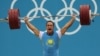 Казахстанский тяжелоатлет Илья Ильин стал двукратным олимпийским чемпионом после того, как на лондонской Олимпиаде обновил мировой рекорд в весе до 94 килограммов. Лондон, 4 августа 2012 года.